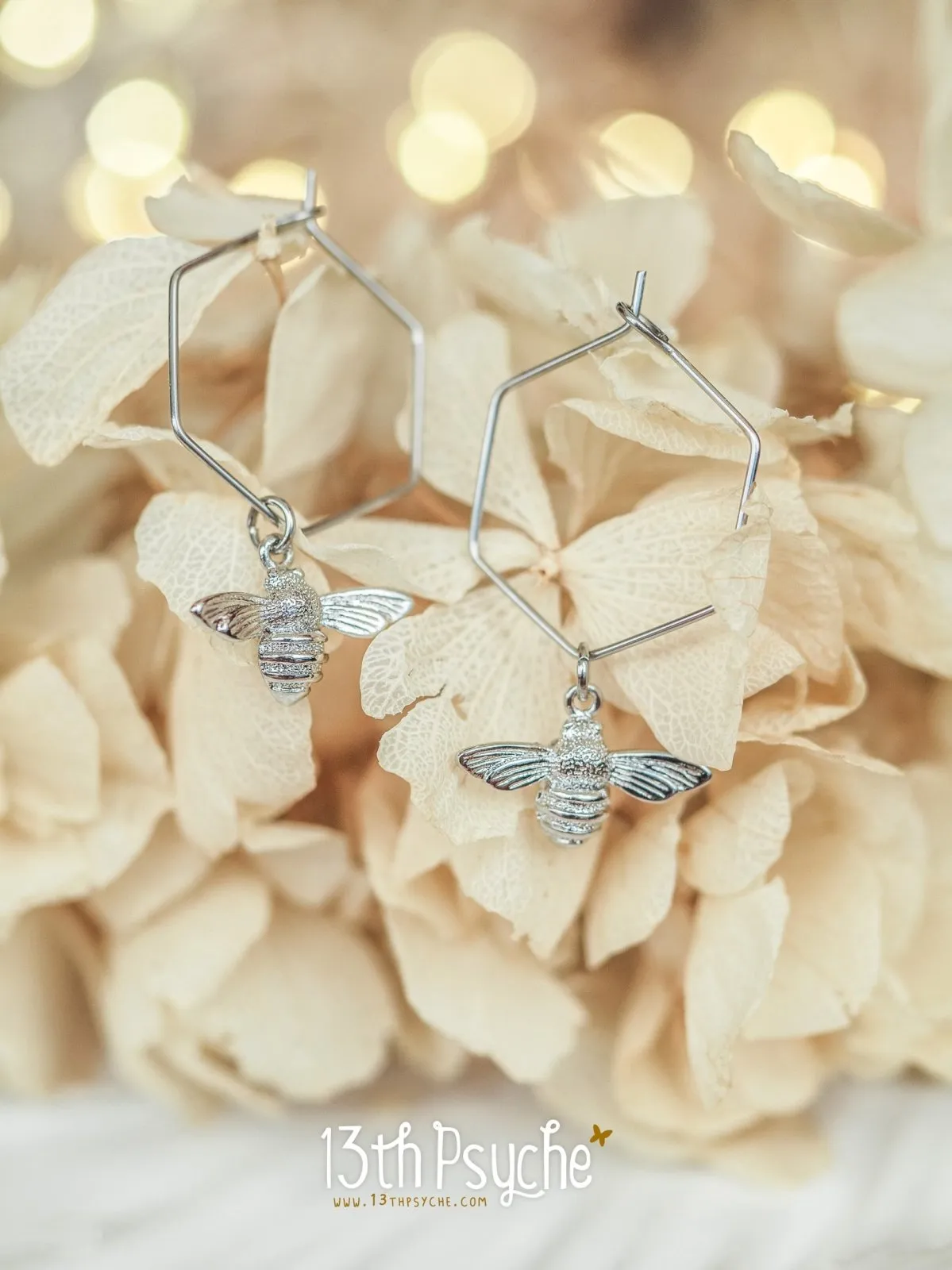 Hexagon hoop earrings with bee charms