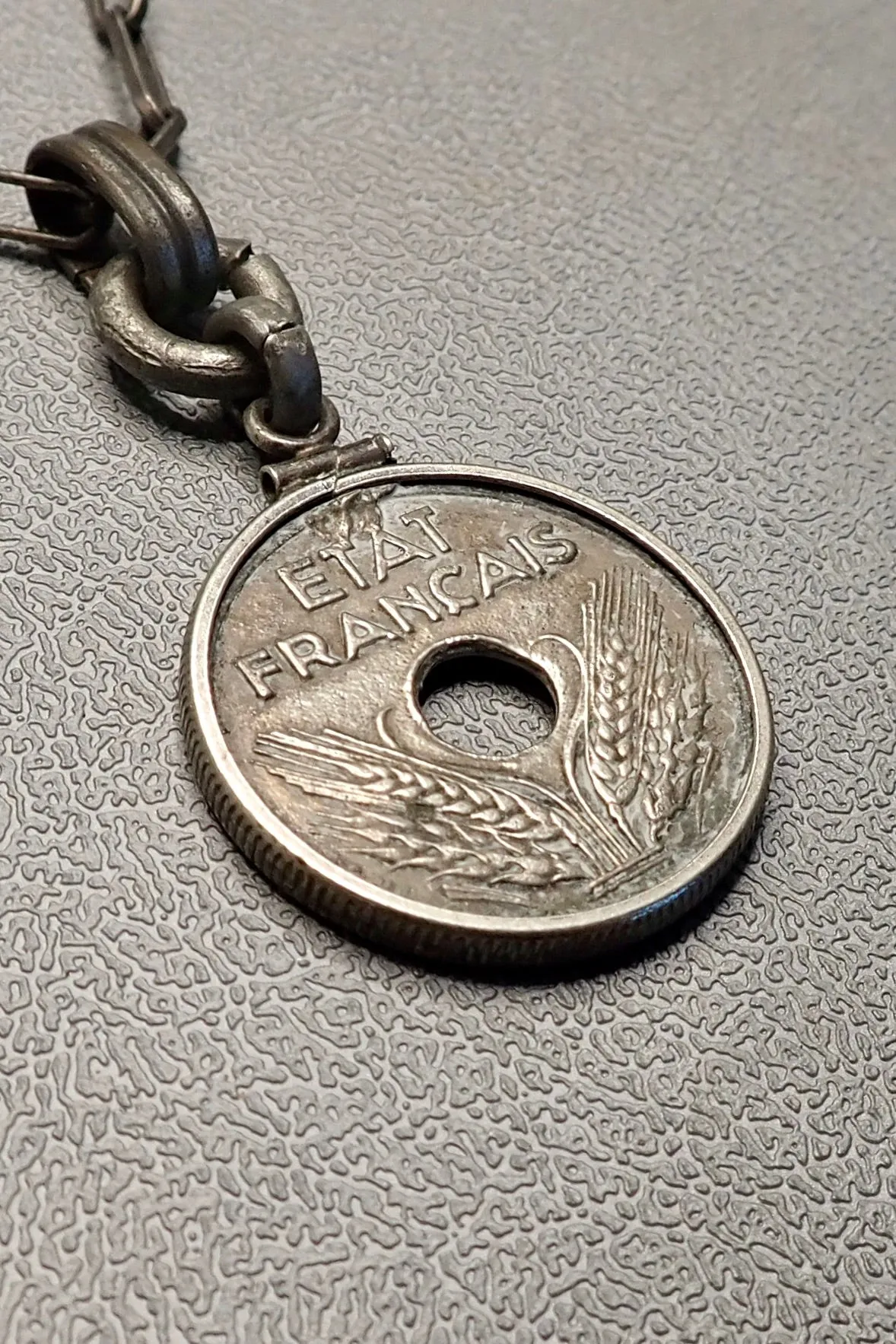 HOLE COIN PENDANT