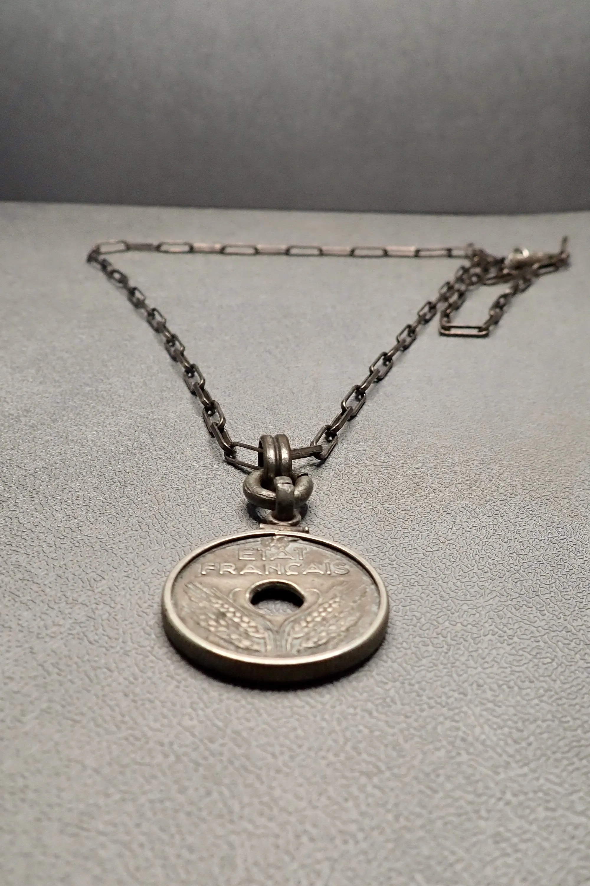 HOLE COIN PENDANT