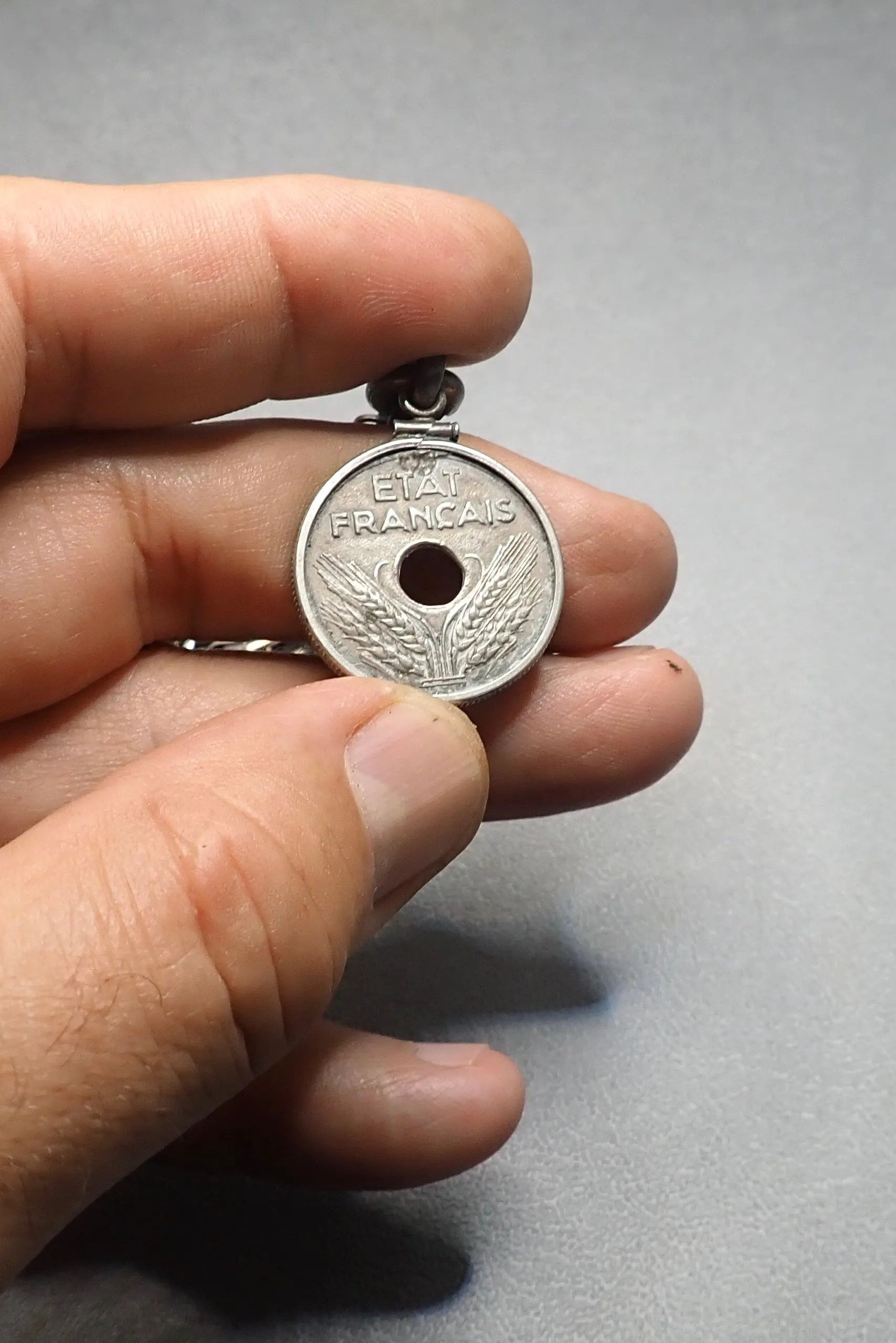 HOLE COIN PENDANT