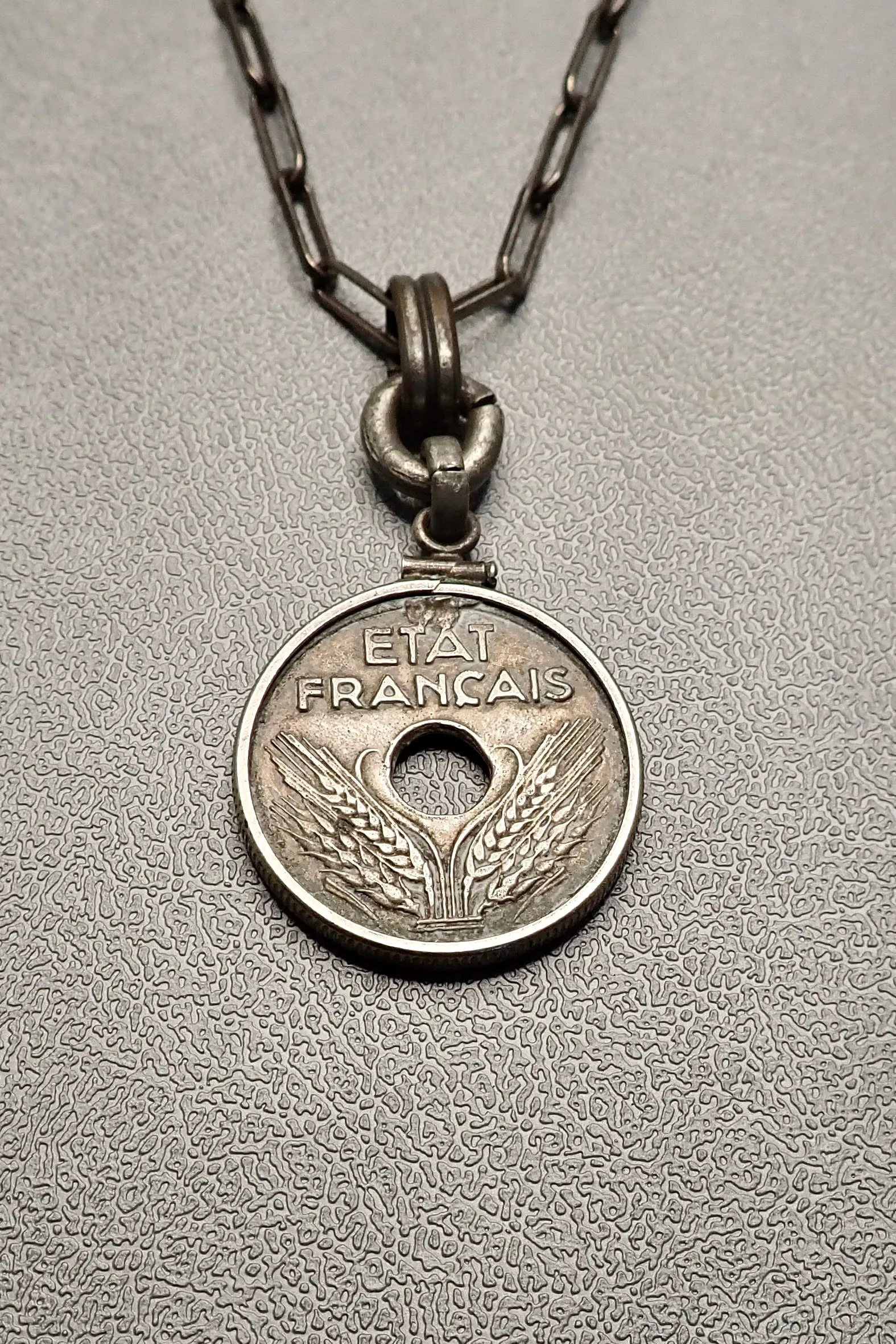 HOLE COIN PENDANT