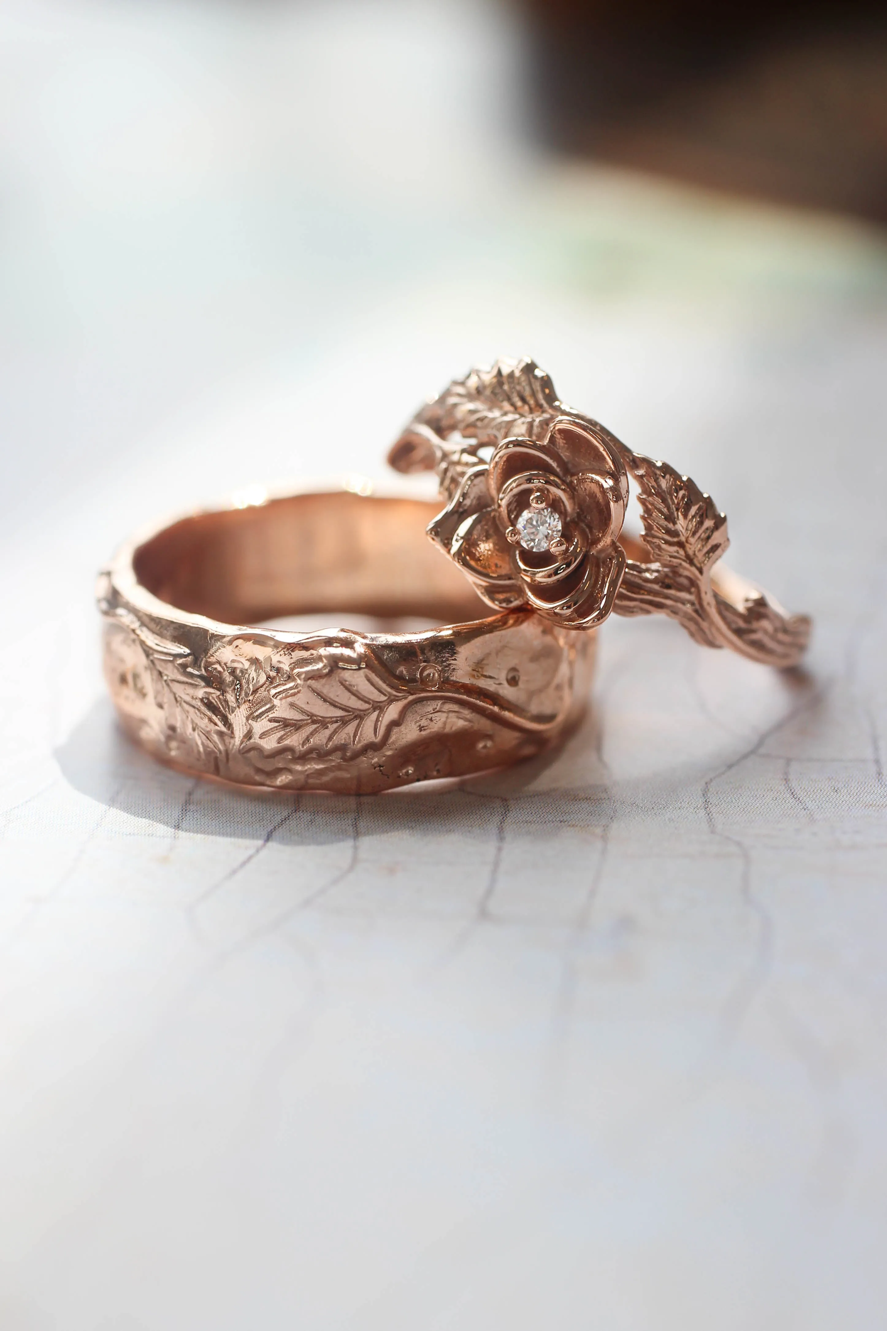 Nature wedding bands set: wide ring for him, rose flower ring for her