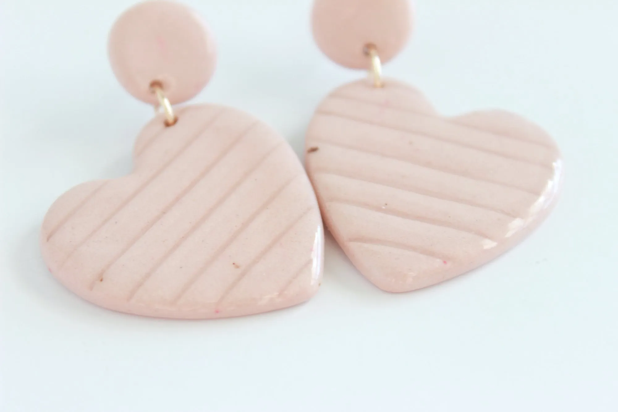 Pink Sideways Heart Statement Earrings