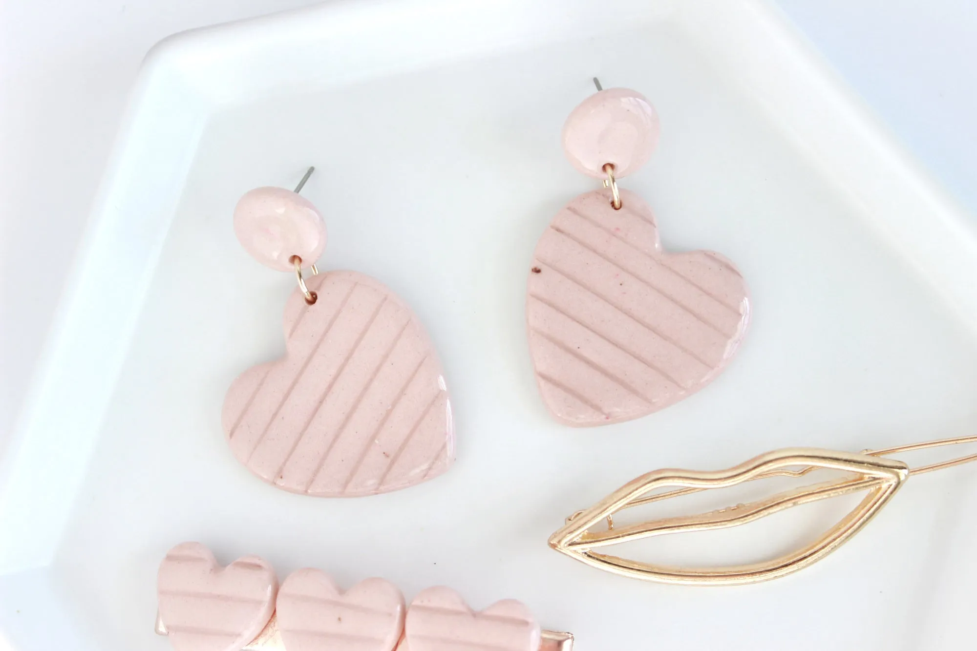 Pink Sideways Heart Statement Earrings